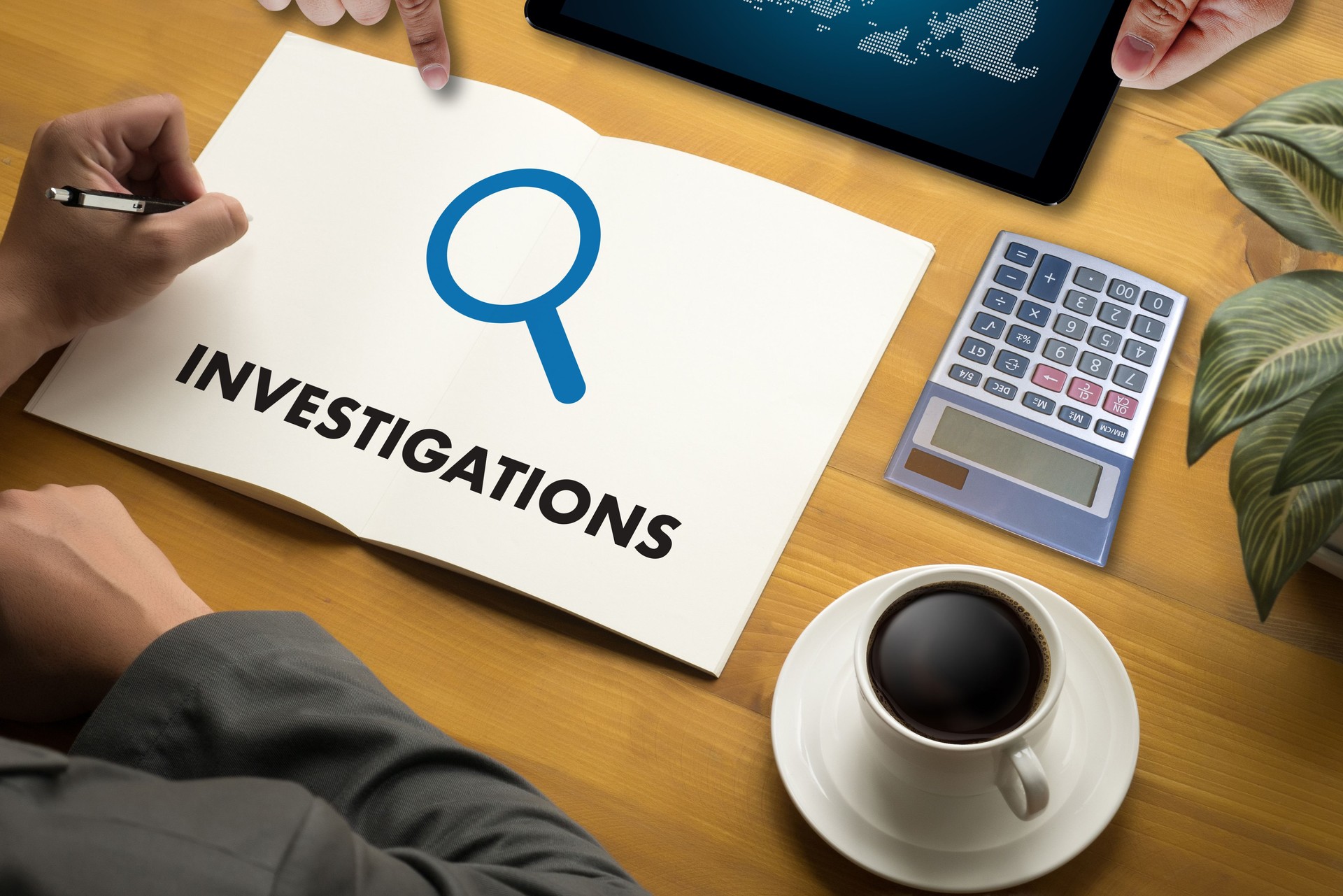 INVESTIGATIONS  Business concept. detective and crime scene